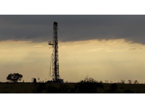 FILE - This Wednesday, May 9, 2012 file photo, shows a drilling rig near Kennedy, Texas. The International Energy Agency said Wednesday Nov. 14, 2018, that global oil supplies are growing rapidly as Saudi Arabia, the United States and Russia pump oil at a record rate in response to fears of higher prices as a result of renewed U.S. sanctions on Iran.