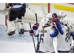 United States players celebrate a goal against Finland during the second period of the 2018 Four Nations Cup opening game in Saskatoon, Tuesday, November 6, 2018.
