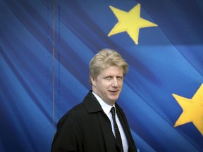 FILE - In this March 28, 2017 file photo, Jo Johnson visits the the European Commission in Brussels. A transport minister in the British government stepped down Friday, Nov. 9, 2018 to protest Prime Minister Theresa May's Brexit plan and is backing calls for a second referendum on whether the country should leave the European Union. Jo Johnson, younger brother of former Foreign Secretary Boris Johnson, said Friday that the withdrawal agreement being discussed would greatly weaken Britain.