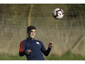 United States national soccer team player Christian Pulisic takes part in their national soccer squad training session at the training facilities of Brentford Football Club in west London, Monday, Nov. 12, 2018. The United States play England in an international friendly soccer match at Wembley stadium in London on Thursday.