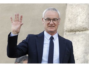 FILE - In this Thursday, March 30, 2017 file photo, soccer coach Claudio Ranieri waves from a balcony of Rome's Capitol Hill,  after receiving an honorary award for his work at Leicester City. The arrival of Claudio Ranieri as Fulham's new coach should ensure an end to the chaotic selections, loose defending and naive approach that marked the team's turbulent first three months back in the Premier League.