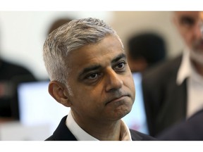 FILE - In this file photo dated Monday, June 11 2018, Mayor of London Sadiq Khan in London.  London Mayor Sadiq Khan announced Monday Nov. 19, 2018, that three water cannons bought for police under predecessor Boris Johnson, have been sold for scrap, at a loss of more than 300,000 pounds (US dollars 385,000).