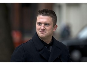 FILE - In this Wednesday, Oct. 16, 2013 file photo, Tommy Robinson the former leader of the far-right EDL "English Defence League" group arrives for an appearance at Westminster Magistrates Court in London.  UK Independence Party chief Gerard Batten on Friday Nov. 23, 2018,  appointed far-right activist Robinson to be the party's adviser on "rape gangs and prison reform."