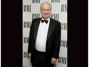 FILE - In this Tuesday, Oct. 4, 2011 file photo, Paul Gambaccini arrives for the BMI Awards at a central London venue. Britain's prosecution service has agreed to pay undisclosed damages to U.S.-born BBC broadcaster Paul Gambaccini over the way it handled unfounded sex abuse allegations against him. The 69-year-old broadcaster said Saturday Nov. 3, 2018, that he is still pursuing separate legal action against police.