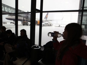 FILE - In this photo dated 2012, passengers wait for flights with flagship carrier Icelandair at Iceland's Trans-Atlantic hub, at Keflavik Airport, Iceland. The struggling low fair airline, Wow, was taken over by Iceland's flagship carrier, Icelandair, and Wow founder and CEO Skuli Mogensen urged his staff Monday Nov. 12, 2018, to "look at this as an opportunity to continue our journey now as a part of a much stronger group".