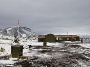 FILE - This Sept. 23, 2009 file photo shows the meteorological station on the Norwegan island Jan Mayen in the Arctic Sea. A powerful earthquake with a preliminary magnitude of 6.8 occurred some 120 kilometers (74 miles) off Jan Mayen on Friday Nov. 9, 2018, in the Arctic Ocean, northwest of a largely uninhabited and remote Norwegian island, officials said. No injuries or damage were immediately reported.