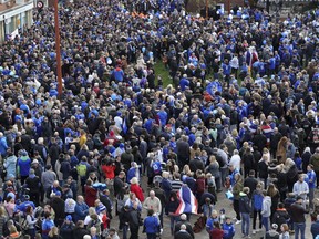 Leicester City fans gather at Jubilee Square in Leicester, before taking part in a memorial walk to the King Power Stadium, in honour of the club's owner Vichai Srivaddhanaprabha and four others who died in a helicopter crash outside the stadium on October 27.  Saturday Nov. 10, 2018.