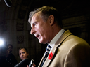Independent MP Maxime Bernier speaks to reporters in the foyer of the House of Commons on Oct. 29, 2018.