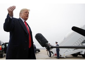 President Donald Trump speaks to the media before boarding Air Force One, Monday, Nov. 5, 2018, in Andrews Air Force Base, Md. Trump is traveling to three campaign rallies.