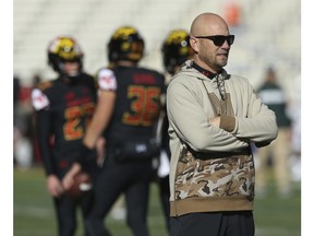 Maryland interim head coach Matt Canada, watches his team warm up before an NCAA college football game against Michigan State, Saturday, Nov. 3, 2018, in College Park, Md.