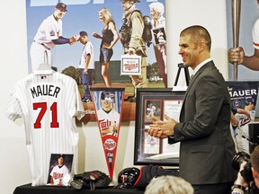 Joe Mauer arrives for his retirement news conference Monday, Nov. 12, 2018, in Minneapolis, after playing 15 major league seasons, all with the Minnesota Twins baseball team.