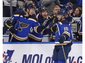 St. Louis Blues' Robby Fabbri, right, is congratulated by teammates Alexander Steen and Zach Sanford, left, after scoring a goal against the Carolina Hurricanes during the first period of an NHL hockey game Tuesday, Nov. 6, 2018, in St. Louis.