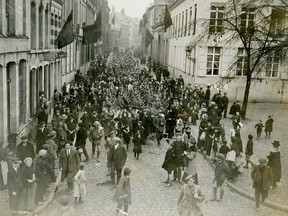 UPLOADED BY: Nick Lees ::: EMAIL: nleesyeg@gmail.com ::: PHONE: 7804823603 ::: CREDIT: Files ::: CAPTION: Canadian 49th Battalion (Edmonton Regiment) troops march into Mons after retaking the Belgium city in 1918.
