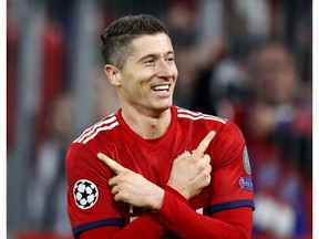 Bayern forward Robert Lewandowski celebrates his side's second goal during the Champions League group E soccer match between FC Bayern Munich and AEK Athen in Munich, Germany, Wednesday, Nov. 7, 2018.