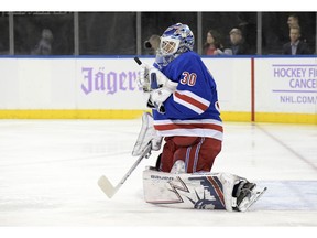 New York Rangers goaltender Henrik Lundqvist (30) blocks the puck during the first period of an NHL hockey game against the Ottawa Senators, Monday, Nov. 26, 2018, at Madison Square Garden in New York.