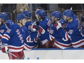New York Rangers left wing Jimmy Vesey (26) celebrates scoring a goal during the first period of an NHL hockey game against the Washington Capitals, Saturday, Nov. 24, 2018, at Madison Square Garden in New York.