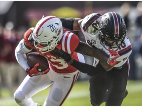 Mississippi wide receiver Braylon Sanders (13) is tackled by South Carolina defensive back R.J. Roderick (10) during an NCAA college football game at Vaught-Hemingway Stadium in Oxford, Miss. on Saturday, Nov. 3, 2018.