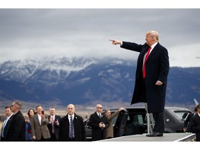 President Donald Trump arrives for a campaign rally at Bozeman Yellowstone International Airport, Saturday, Nov. 3, 2018, in Belgrade, Mont.