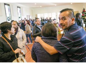 In this Dec. 13, 2017, photo Samuel Oliver-Bruno glances back before preparing for interviews after the press conference held at CityWell United Methodist Church in Durham, N.C. Oliver-Rruno, who sought refuge from deportation at the church for 11 months was arrested Friday after arriving at an appointment with immigration officials.