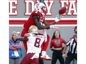 North Carolina State's Kelvin Harmon (3) hauls in a pass for a touchdown against Florida State's Stanford Samuels III (8) during the first half of an NCAA college football game in Raleigh, N.C., Saturday, Nov. 3, 2018.