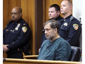 Paul Caneiro appears in Monmouth County Superior Court for a detention hearing on Friday, Nov. 30, 2018 in Freehold, N.J. Caneiro, 51, faces four counts of murder, along with arson and weapons charges, in the deaths of his brother Keith; Keith's wife, Jennifer; their 11-year-old son, Jesse; and their 8-year-old daughter, Sophia.
