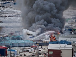 A fire burns at a Northmart store in Iqaluit, Nunavut on Thursday, November 8, 2018.