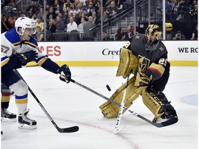 St. Louis Blues left wing David Perron (57) shoots the puck against Vegas Golden Knights goaltender Marc-Andre Fleury during the first period of an NHL hockey game Friday, Nov. 16, 2018, in Las Vegas.