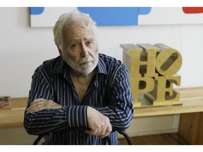 FILE - In this Aug. 29, 2009, file photo, artist Robert Indiana poses at his studio in Vinalhaven, Maine.  The estate of Indiana, creator of the iconic LOVE series, is auctioning off two paintings that belonged to him to raise money to defend against a lawsuit and to stabilize his deteriorating home.