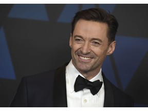 FILE - In this Nov. 18, 2018 file photo, Hugh Jackman arrives at the Governors Awards at the Dolby Theatre in Los Angeles. Jackman will launch his first ever world tour next year, performing at arenas mostly reserved for pop, rock and rap stars. Jackman announced his "The Man. The Music. The Show." tour on Thursday, Nov. 29,  which will feature Jackman singing songs from "The Greatest Showman," "Les Miserables" and Broadway musicals, among other selections.