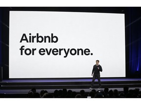 FILE - In this Feb. 22, 2018 file photo, Airbnb co-founder and CEO Brian Chesky speaks during an event in San Francisco.  Airbnb says it had its best quarter ever, even as cities across the U.S. have started clamping down on the short-term rental market. The private San Francisco-based company said Friday, Nov. 16, 2018  its revenue for the third quarter easily topped $1 billion as guest reservations boomed internationally in places like Beijing, Mexico City and Birmingham, England.