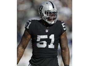 FILE - In this Dec. 3, 2017, file photo, Oakland Raiders outside linebacker Bruce Irvin (51) waits for a play by the New York Giants during an NFL football game in Oakland, Calif. The Raiders are planning to cut Irvin after the team's leading pass rusher's playing time was significantly reduced in recent weeks. A person familiar with the decision said Saturday, Nov. 3, the move should be official next week. The person spoke on condition of anonymity because the team hadn't announced the transaction. The Athletic first reported the decision.