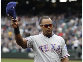 FILE - In this Sept. 30, 2018, file photo, Texas Rangers' Adrian Beltre tips his cap as he walks off the field during the fifth inning of a baseball game against the Seattle Mariners, in Seattle. Beltre has decided to retire after 21 seasons and 3,166 hits in the majors leagues. Beltre announced his decision in a statement released by the Rangers on Tuesday morning, Nov. 20, 2018.