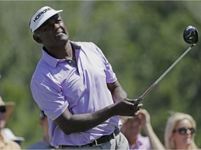 FILE - In this  Friday, May 12, 2017 file photo, Vijay Singh, of Fiji, hits from the ninth tee during the second round of The Players Championship golf tournament in Ponte Vedra Beach, Fla. After five years of litigation, the PGA Tour announced Tuesday, Nov. 20, 2018 it has reached a settlement with Singh on his lawsuit over an anti-doping investigation.