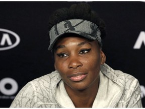 FILE - In this Jan. 28, 2017, file photo, Venus Williams answers questions at a press conference following her loss to sister Serena in the women's singles final at the Australian Open tennis championships in Melbourne, Australia. Court records show that tennis star Venus Williams has settled a wrongful death lawsuit related to a fatal car crash in Florida. Palm Beach County court records show that the case was closed last week. Terms of the agreement between Williams and the estate of 78-year-old Jerome Barson weren't included in the documents.