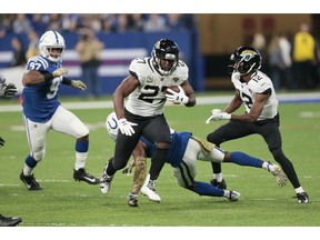 FILE - In this Nov. 11, 2018, file photo, Jacksonville Jaguars running back Leonard Fournette (27) runs against the Indianapolis Colts during the first half of an NFL football game in Indianapolis. The Steelers are soaring. After a sluggish start, they have won five straight game, including a 52-21 victory a week ago Thursday against the Carolina Panthers when Ben Roethlisberger had a perfect quarterbacking rating for the first time in nearly 11 years. "They're going to come in with a chip on their shoulder," Fournette said.
