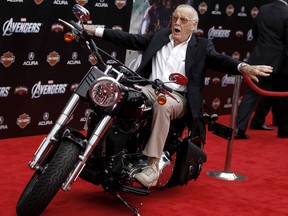 FILE - In this April 11, 2012, file photo,Stan Lee arrives at the premiere of "The Avengers" in Los Angeles. Comic book genius Lee, the architect of the contemporary comic book, has died. He was 95. The creative dynamo who revolutionized the comics by introducing human frailties in superheroes such as Spider-Man, The Fantastic Four and The Incredible Hulk, was declared dead Monday, Nov. 12, 2018, at Cedars-Sinai Medical Center in Los Angeles, according to Kirk Schenck, an attorney for Lee's daughter, J.C. Lee.