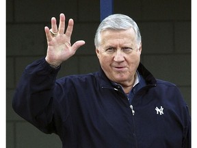 FILE - In this Feb. 17, 2004, file photo, New York Yankees owner George Steinbrenner waves to fans in Tampa, Fla. Steinbrenner, former managers Lou Piniella, Davey Johnson and Charlie Manuel, and six players headed by Lee Smith are on the 10-man ballot for the baseball Hall of Fame's today's game era committee to consider Dec. 9, 2018.