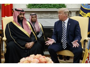 FILE - In this March 20, 2018, file photo, President Donald Trump meets with Saudi Crown Prince Mohammed bin Salman in the Oval Office of the White House in Washington. The prince and Trump are attending the upcoming Group of 20 summit in Argentina.