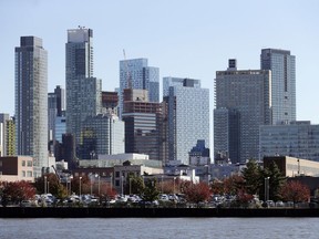 In this Wednesday, Nov. 7, 2018, photo, the Long Island City waterfront and skyline are shown in the Queens borough of New York. One of the areas that Amazon is considering for a headquarters is Long Island City. An old manufacturing area, it's cultivating a new image as a hub for 21st-century industry, creativity, and urbane living.