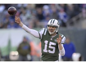 FILE - In this Nov. 11, 2018 file photo, New York Jets quarterback Josh McCown (15) passes during the second half of an NFL football game against the Buffalo Bills in East Rutherford, N.J. McCown will get his second straight start when the Jets take on the New England Patriots on Sunday, Nov. 25.