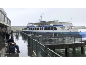 In this image taken from video a ferry carrying dozens of passengers crashes into a dock at San Francisco's famed Ferry Building on Friday, Nov. 23, 2018. (Tiffany Dennis via AP)