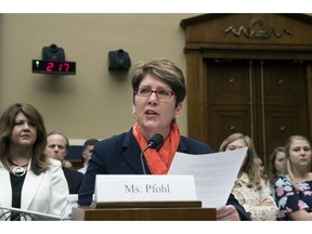 FILE - In this May 23, 2018 file photo, U.S. Center for SafeSport President and CEO Shellie Pfohl testifies before the House Commerce Oversight and Investigations Subcommittee about the Olympic community's ability to protect athletes from sexual abuse, on Capitol Hill in Washington. A growing sex-abuse problem in Olympic sports has led to a steady stream of Congressional hearings and a three-year grant worth $2.2 million. Yet not a penny of those federal funds can be used to fight the actual problem: investigating or resolving more than 800 open cases, many brought by victims themselves.