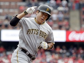 FILE - In this Oct. 1, 2016, file photo, Pittsburgh Pirates' Jung Ho Kang rounds the bases after hitting a three-run home run during the first inning of a baseball game against the St. Louis Cardinals in St. Louis. The Pirates and the veteran third baseman agreed to a one-year deal Thursday, Nob. 8, 2018, that will bring Kang back for the 2019 season.