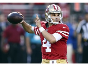 FILE - In this Nov. 1, 2018, file photo, San Francisco 49ers quarterback Nick Mullens throws a pass against the Oakland Raiders during the first half of an NFL football game in Santa Clara, Calif. The 49ers are sticking with Nick Mullens as their starting quarterback after his spectacular debut performance. Mullens said coach Kyle Shanahan told him Tuesday, NOv. 6, 2018, that he will remain the starter for the upcoming game against the New York Giants.