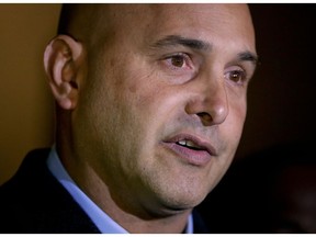 FILE - In this Nov. 8, 2017 file photo, former sports radio host Craig Carton speaks to members of the media after his arraignment in federal court in New York. Carton, a former co-host of a sports radio show with ex-NFL quarterback Boomer Esiason, has been convicted of fraud. The verdict against Carton was returned by a jury Wednesday, Nov. 7, 2018, at a federal court in New York.