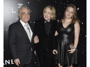 Honoree Martin Scorsese, left, poses with his wife Helen Morris and daughter Francesca Scorsese at the Museum of Modern Art Film Benefit tribute to Martin Scorsese, presented by Chanel, on Monday, Nov. 19, 2018, in New York.