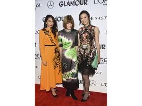 Political advisor Huma Abedin, left, Vogue editor-in-chief Anna Wintour and producer Wendi Deng Murdoch attend the Glamour Women of the Year Awards at Spring Studios on Monday, Nov. 12, 2018, in New York.