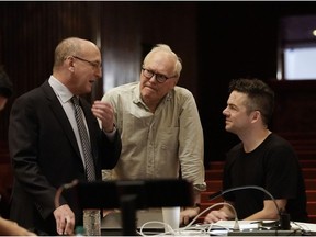 This Oct. 11, 2018 photo released by the Metropolitan Opera shows Composer Nico Muhly, right, with general manager Peter Gelb, left, and librettist Nicholas Wright during rehearsals for "Marnie," at the Metropolitan Opera in New York.
