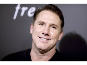 FILE - In this Feb. 1, 2016 file photo, Nicholas Sparks attends a special screening of "The Choice" in Los Angeles. A federal judge says the headmaster forced out of running a private Christian school founded by Sparks after less than five months can continue to sue the author, the North Carolina school, and the foundation Sparks created to support it.