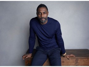 FILE - In this Jan. 21, 2018, file photo, actor-director Idris Elba poses for a portrait to promote his film "Yardie" at the Music Lodge during the Sundance Film Festival in Park City, Utah. On Monday, Nov. 5, 2018, Elba was named Sexiest Man Alive by People magazine.